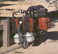 touring bike with water containers. Innamincka Store
